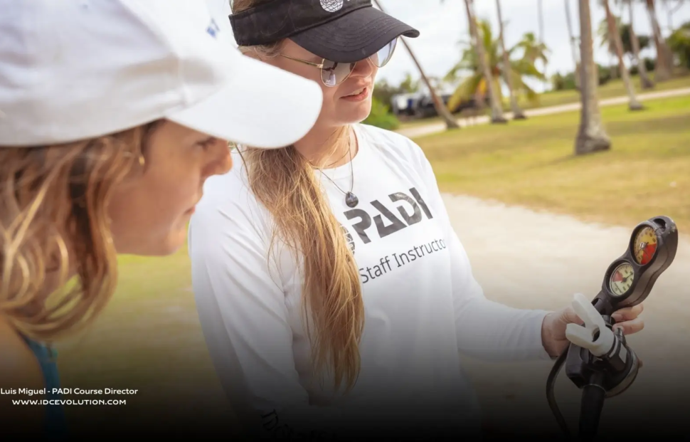 Dive instructor skills during confined water briefing, clear coaching and calm leadership with students